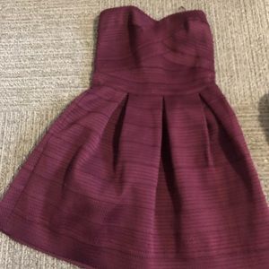 plum colored dress with pleating